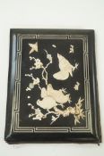An oriental art folio carved with birds