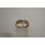 A 9ct gold diamond ring