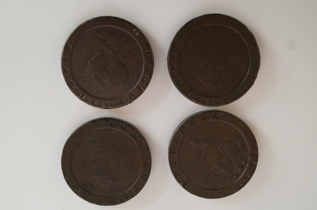 Four cartwheel two pence pieces