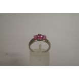 A 9ct gold pink topaz and diamond ring