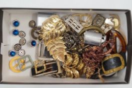 A collection of assorted costume buckles