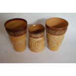 A Doulton Lambeth beaker and mug, and on