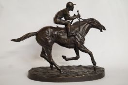 A 20th century bronze of a jockey and ra