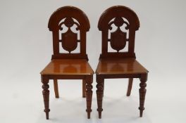 A pair of 19th century hall chairs