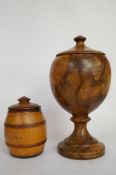 A carved wood cup and cover, along with