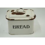 A vintage enamel bread bin