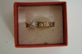 A 9ct gold diamond cluster ring, finger