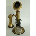A 20th century brass stick telephone