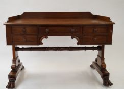 A Victorian mahogany desk with claw feet