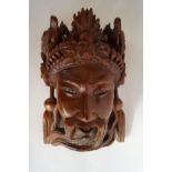 A 20th century Japanese hardwood carved