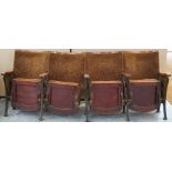 A set of four 1950's cinema chairs, each