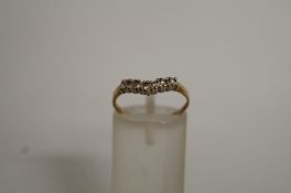 A cubic zirconia 9ct gold ring, finger s