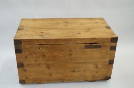 A stripped pine and oak blanket box