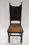 A late 19th century heavily carved dark