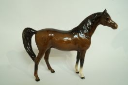 A Beswick horse, with a chipped ear