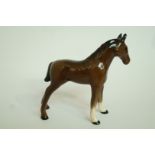 A small Beswick brown horse, standing