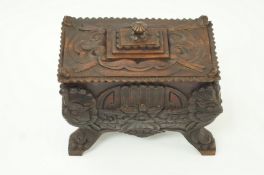 An oriental carved hardwood box and cove