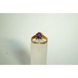 An amethyst 9 carat gold single stone ri