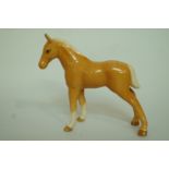 A Beswick Palomino foal