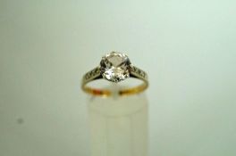 A single stone paste ring, stamped '9ct