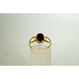 WITHDRAWN A 9 carat gold onyx ring, the