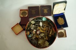 A collection of various military badges,