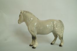 A Beswick grey pony