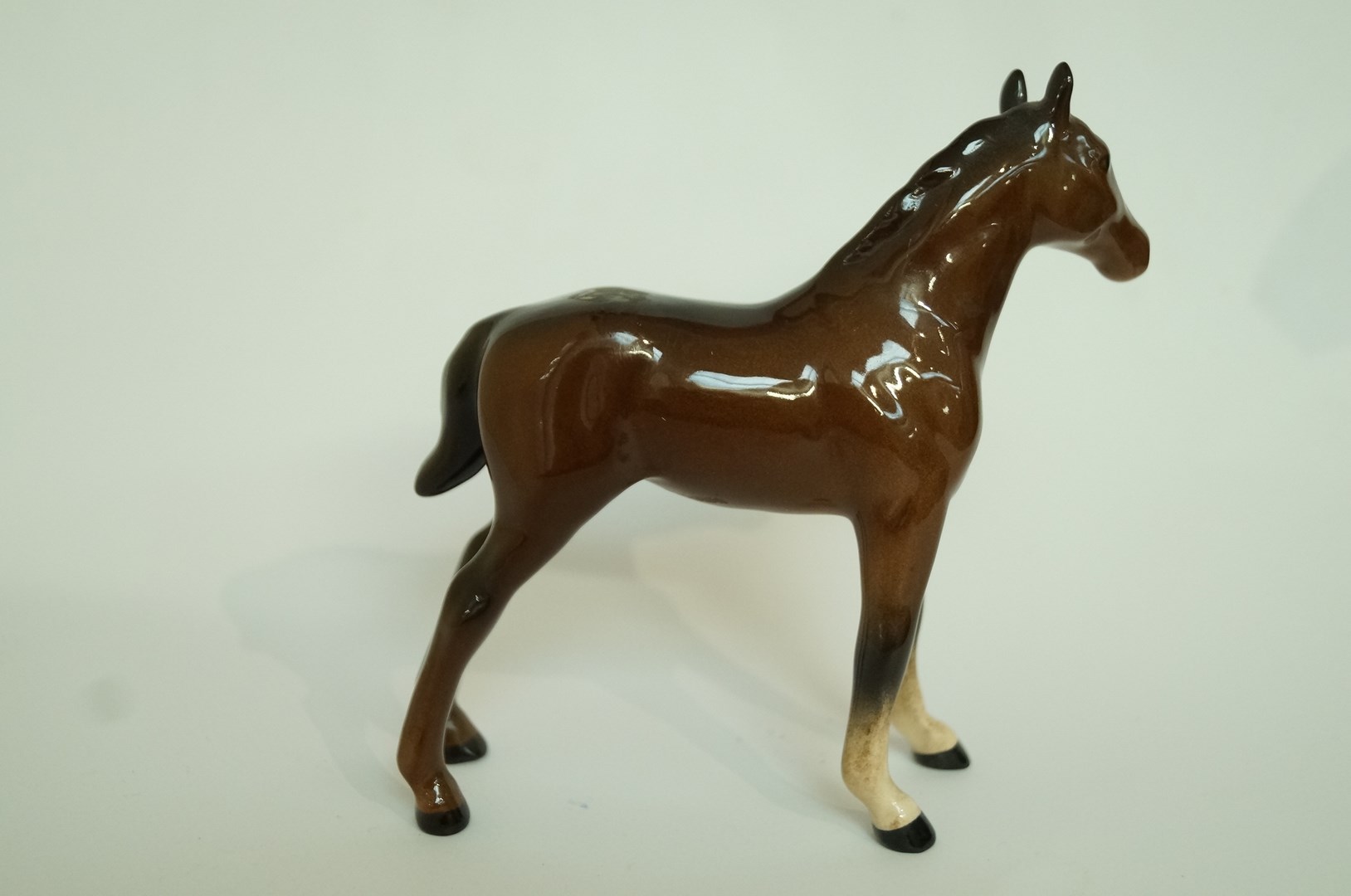 A Beswick brown foal, standing