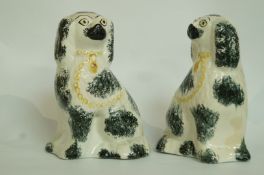 A pair of small Beswick dogs, black and