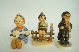 Three Goebel figures