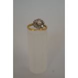 A seven stone diamond 18 carat gold ring