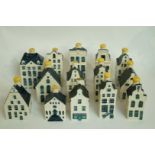 A collection of 14 KLM model houses