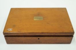 A wooden canteen case