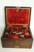 A 19th century rose wood travelling comp