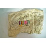 A collection of WWII miniature medals in