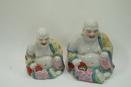 A pair of 20th century Buddha figures