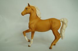 A Beswick palomino horse