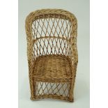 A child's wicker chair
