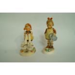 A pair of Goebel figures