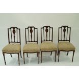 A set of four Edwardian dining chairs