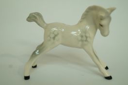 A small Beswick dapple grey foal