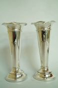 A pair of Edwardian silver bud vases, by