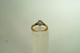 A single stone diamond 9 carat gold ring