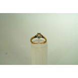 A single stone diamond 9 carat gold ring