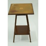 An Edwardian square top side table