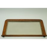 A mahogany inlaid mirror