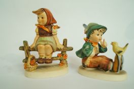 A pair of Goebel figures