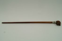 A Malacca walking cane with wide silver