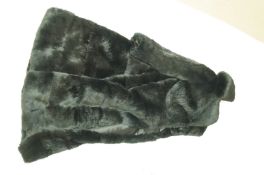 A black fur Jacket, possibly rabbit fur