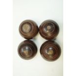 A set of four wooden bowls
